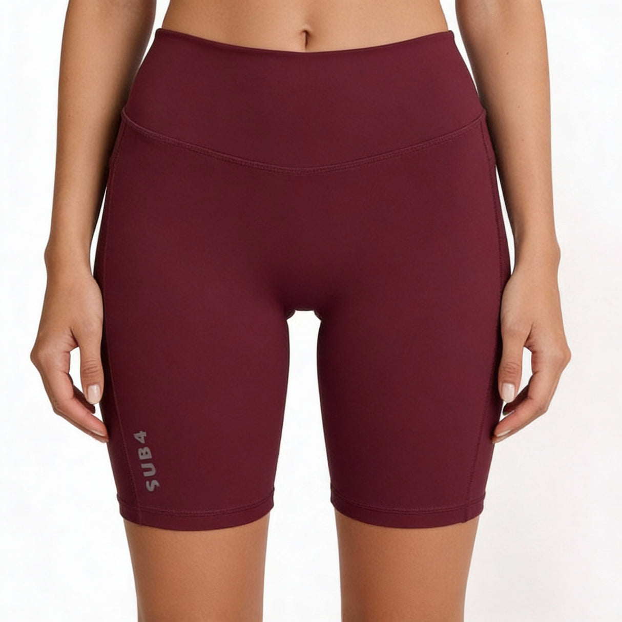 Maroon athletic shorts with Sub4 logo on a white background
