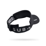 A black athletic visor with a wide, adjustable elastic strap featuring the brand name 'SUB4' in bold white letters. The visor itself has 'SUB4' printed on the side.