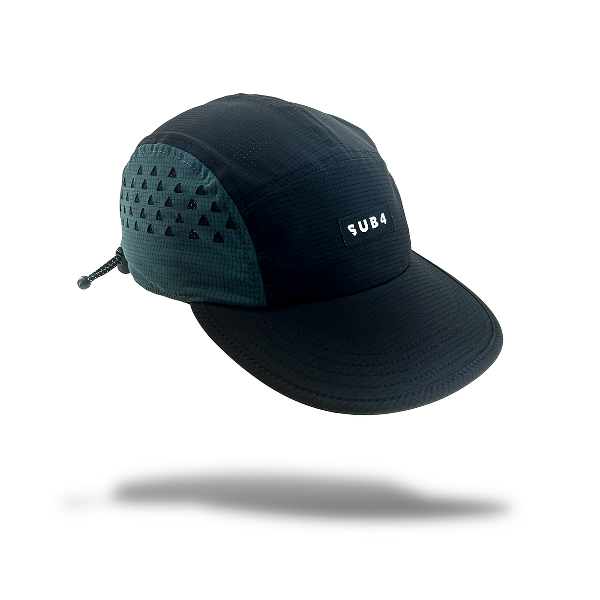 A dark navy running cap with a dark teal patterned side panel and a white 'SUB4' logo on the front, shown against a white background with a soft shadow underneath.