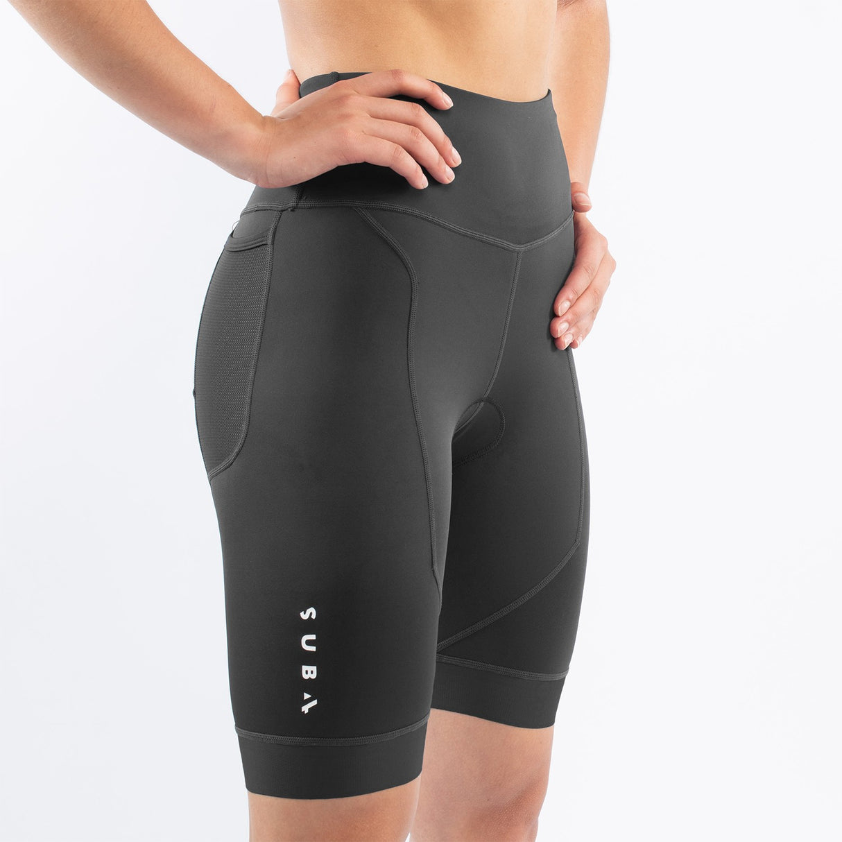 Black athletic triathlon shorts with SUB4 branding worn by a woman on a white background