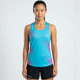 Woman wearing a blue athletic tank top with a geometric pattern on a white background
