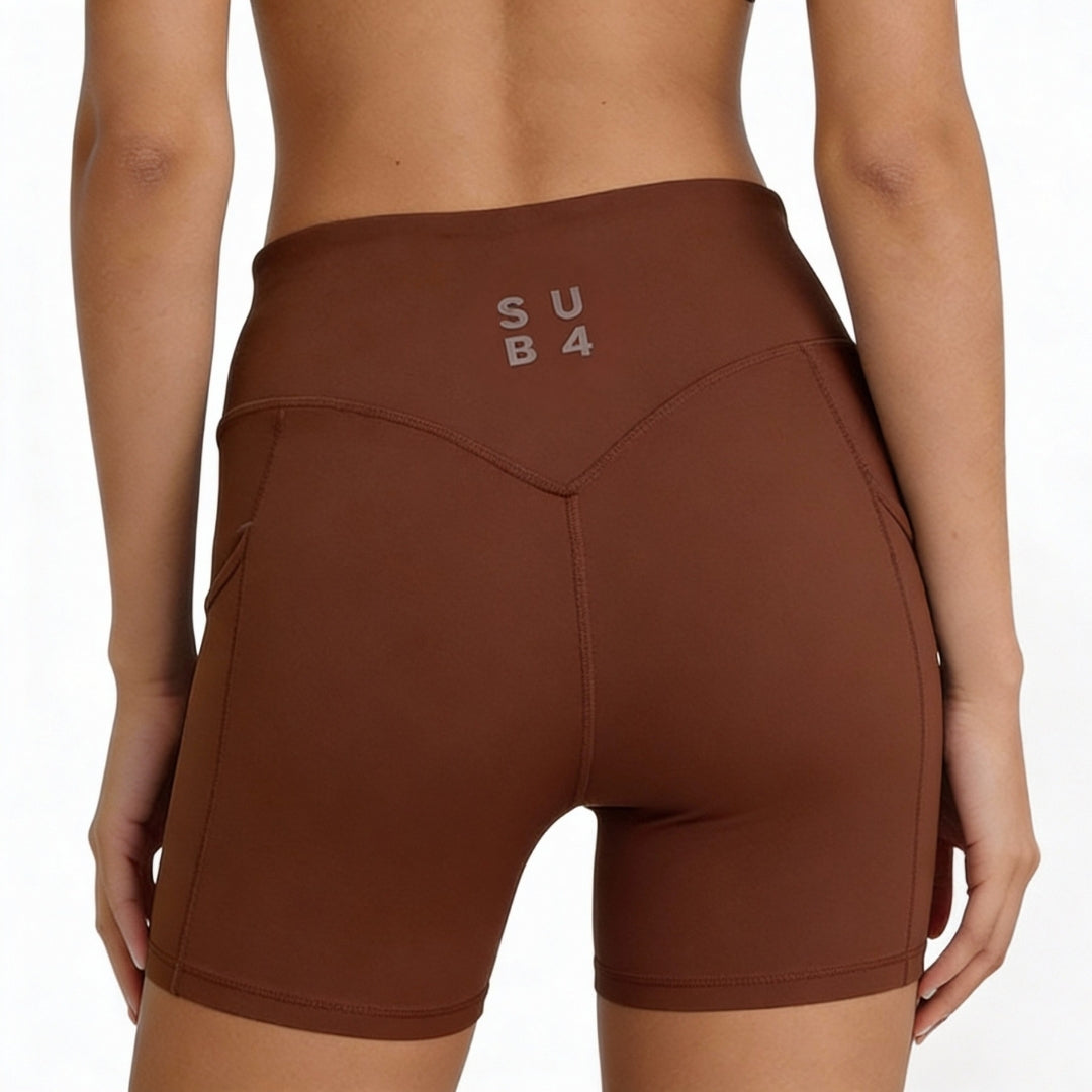Mocha athletic shorts with 'SUB 4' logo on a white background