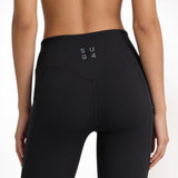Black athletic yoga leggings with 'SUB4' logo on a white background