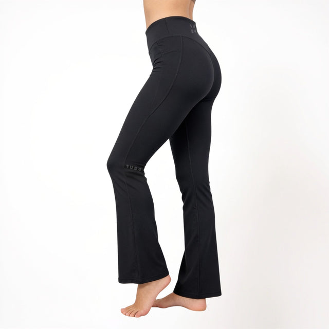 Black athletic yoga pants on a white background