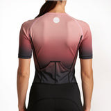 Person wearing a Berry and Triathlon suit on a white background back view