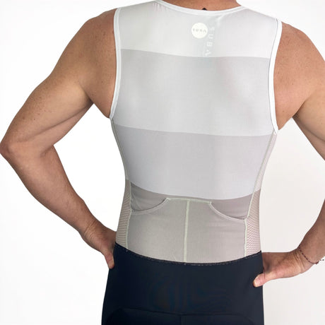 Person wearing a white Tri Suit on a white background